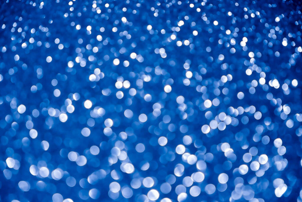 blue navy background glitter silver christmas texture abstract light glittering stars on bokeh. glitter vintage lights background - Foto, imagen