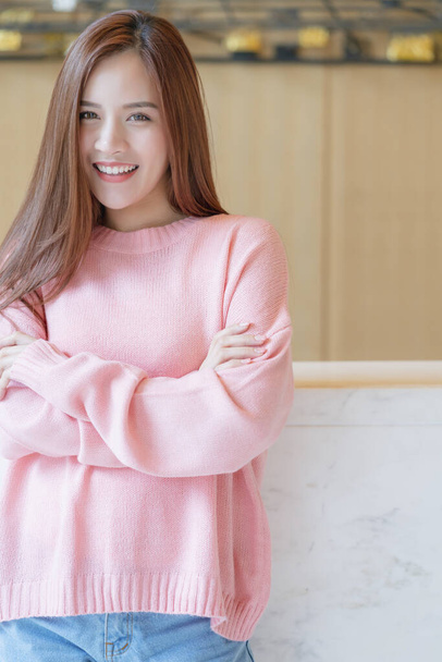 beautiful asian woman long brown hair portrait pink sweater with - Photo, Image
