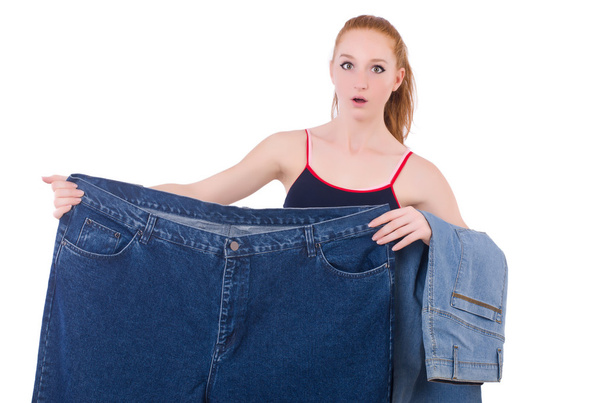 Woman with large jeans in dieting concept - Foto, Imagem