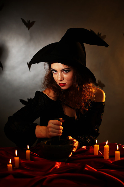 Halloween witch on dark background - Фото, изображение