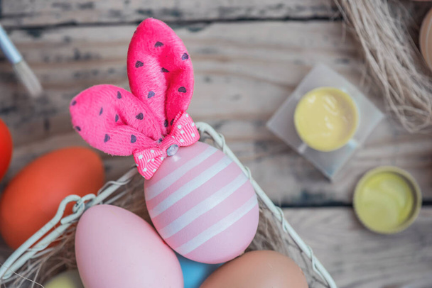 close-up shot of colorful easter eggs on wooden table - Fotó, kép