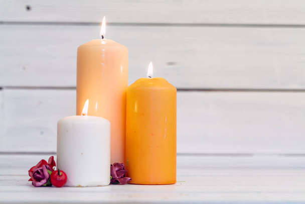 home lighting candles on wooden table creative photo. - Photo, Image