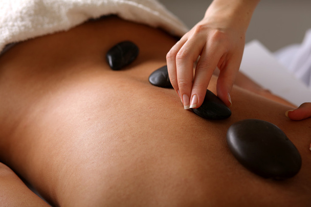 Woman enjoying a back massage - Foto, Imagem