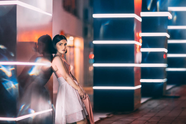 Young girl on street at night - Valokuva, kuva