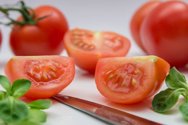 Tomatoes,field lettuce and knives - Fotoğraf, Görsel