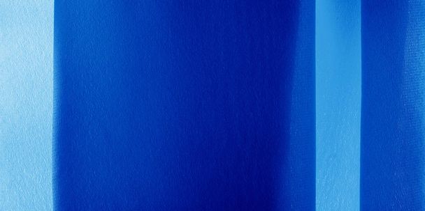 Foto. Texture, sfondo. Tessuto di seta zaffiro blu. Questo lussuoso tessuto morbido ha una superficie ultra-morbida e cremosa con una pila di 10 mm di sfumature di grigio
. - Foto, immagini