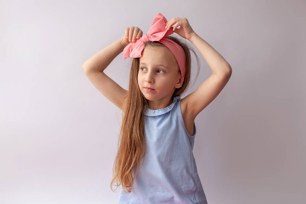 Little adorable girl with headband. - Фото, зображення
