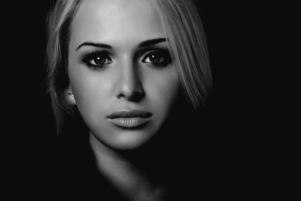 Art portrait of beautiful blond woman.black background - Foto, immagini