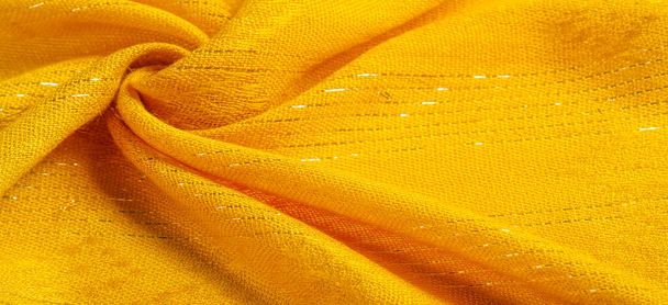 Doku, arkaplan, desen, parıltılı sarı altın kumaş, altın kripton çizgili sarı şerit, tasarımcı kumaşı - Fotoğraf, Görsel