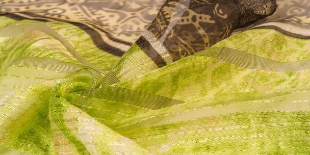 Texture, pattern, background, collection, silk fabric, female delicate scarf, green-brown color, abstract print, exquisite design. - Photo, Image