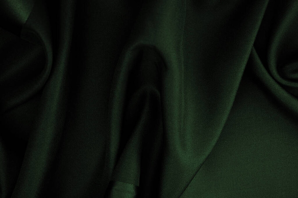 Textura, fondo, patrón, tela de seda esmeralda, esto es tejido de satén de seda. Se diferencia en densidad, suavidad y brillo de la parte frontal, suavidad, está bien drapeado. Uso diseño, proyectos - Foto, Imagen