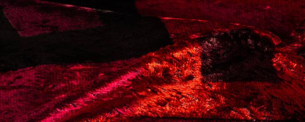 Textur, Hintergrund, Muster, Design, rotgelb braunes Samtgewebe, dichtes Gewebe aus Seide, Baumwolle oder Nylon mit einem dicken, kurzen Flor auf einer Seite. - Foto, Bild