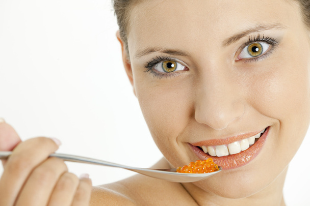 Woman with red caviar - Photo, Image