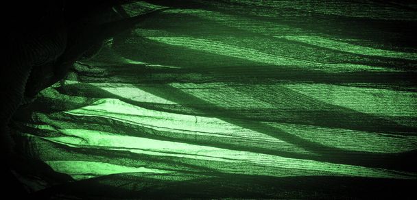 テクスチャ、背景、パターン、クレープ深い緑は、はっきりとしたクリップ状の外観を持つシルク、ウールまたは合成繊維の生地です。.  - 写真・画像