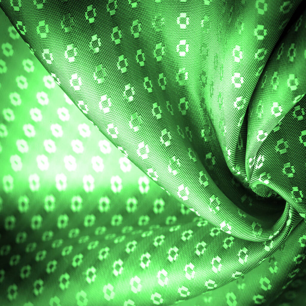 Struttura di fondo, colore verde smeraldo tessuto è sottile, forte, morbido, fibra lucida ottenuta da bachi da seta nella fabbricazione di bozzoli e assemblati per la fabbricazione di fili e tessuti. - Foto, immagini
