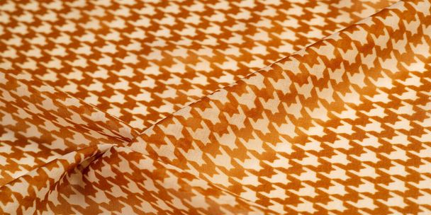 Texture, background, pattern, silk fabric, brown on a white background. pattern on ala fabric of famous french modeler. projects will fulfill your desires you are known - Photo, Image