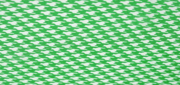 Texture, sfondo, motivo, tessuto di seta, la luminosità del colore verde su uno sfondo bianco. Modello sul tessuto ala famoso stilista francese. progetti soddisferanno i vostri desideri siete conosciuti - Foto, immagini