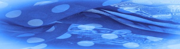 背景の質感、装飾品、青い水玉の絹織物、形がほぼ円やシリンダーに似ている生地の丸いドット. - 写真・画像