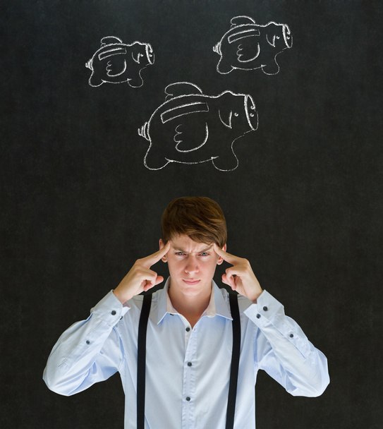 Thinking businessman with flying money piggy banks in chalk on blackboard background - Photo, image