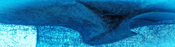 Texture de fond, ornement décoratif, tissu de soie bleue, fils tissés sur le tissu, effet moelleux, sensation, apparence ou texture de surface - Photo, image