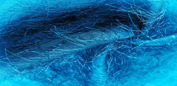 textura pozadí, dekorativní ozdoba, modrá hedvábná tkanina, tkaniny na tkanině, nadýchaný efekt, pocit, vzhled nebo povrchový textur - Fotografie, Obrázek