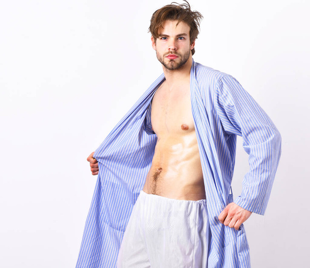 Man with beard in blue dressing gown on white background. - Photo, image