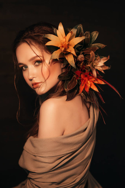 portrait of  beautiful girl with bright flowers - 写真・画像