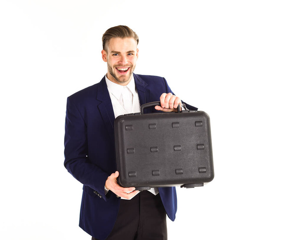 Businessman delivering briefcase. Man in suit or businessman - 写真・画像