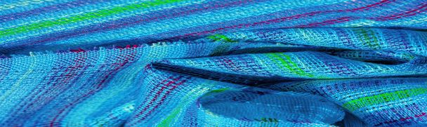 textura, fondo, patrón, postal, tela azul turquesa rayas azules líneas verdes, prendas de punto elásticas muy ligeras, brillo ligero - Foto, Imagen