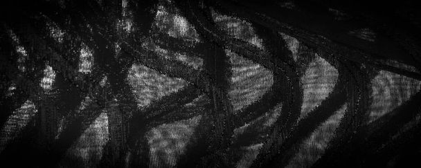 Текстура фонового изображения, ткань прозрачна с ярко врожденными полосами, материалом, позволяющим свету проходить сквозь нее так, чтобы объекты сзади были отчетливо видны. - Фото, изображение