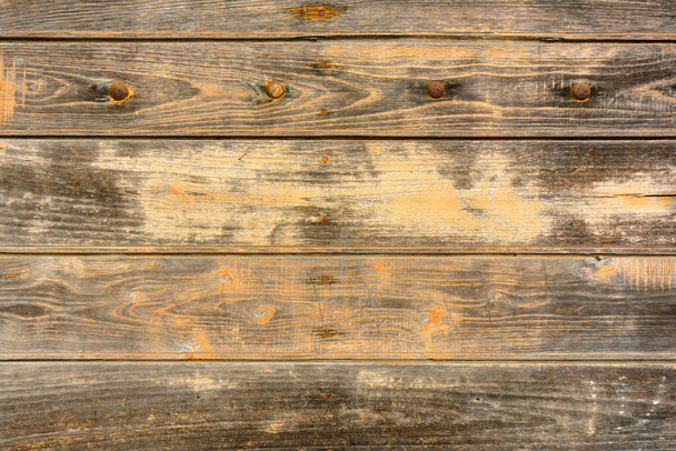 Close-up of an old weathered board wall - Foto, imagen