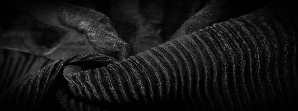 Textura, fundo, padrão, Crepe preto, é um tecido de seda, lã ou fibras sintéticas com uma aparência nitidamente clara, frisada
.  - Foto, Imagem