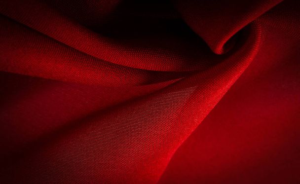 Textura, pozadí, vzor, červený satén je tkanina, která má obvykle lesklý povrch a matný hřbet, saténová vazba se vyznačuje čtyřmi nebo více výplňovými nebo útkovými nitěmi, - Fotografie, Obrázek
