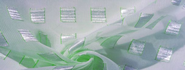 textura, fundo, padrão, cartão postal, tecido de seda com inserções de platina quadrada de metal afiadas com linha de esmeralda, cores pastel aquamarine - Foto, Imagem