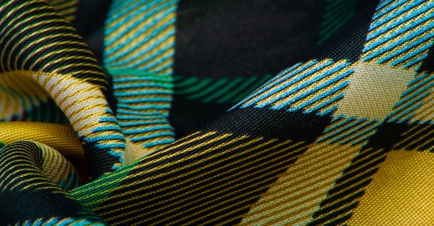 Texture, fond, motif, tissu à carreaux, couleurs jaune-vert-blanc-bleu, motifs écossais dans ce tissu, votre design avec les sons de cornemuses et de whisky parfumé - Photo, image