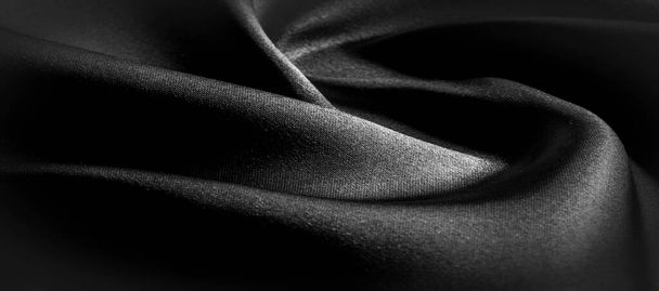 textúra, háttér, mintázat. Fekete selyemszövet. Ez a fekete és hőálló, szürke. Átalakítani a keményebb kendő egy design minden esetben. Ez egy ropogós, enyhén textúrázott kéz. - Fotó, kép