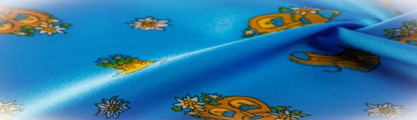 Textura, fondo, patrón, seda azul con una huella de zapato en forma de maceta, Organza es una tela delgada, lisa y transparente tradicionalmente hecha de seda. - Foto, Imagen