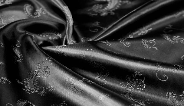 Textura, černá hedvábná tkanina s Paisleym tiskem. Nádherná měkká a tmavá tkanina s krásným vzorem v šedé barvě, byla by stejně krásná pro váš design, tapetu, plakáty - Fotografie, Obrázek