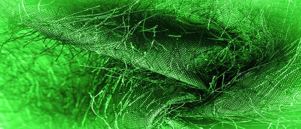 Texture de fond, ornement décoratif, tissu de soie verte, fils tissés sur le tissu, effet moelleux, sensation, apparence ou texture de la surface - Photo, image