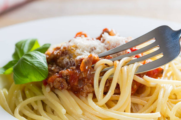 Spaghetti with Bolognese sauce Parmesan and basil. - Fotografie, Obrázek