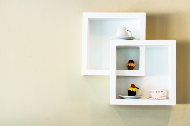 Stylish coffee shelf on a wall - Φωτογραφία, εικόνα