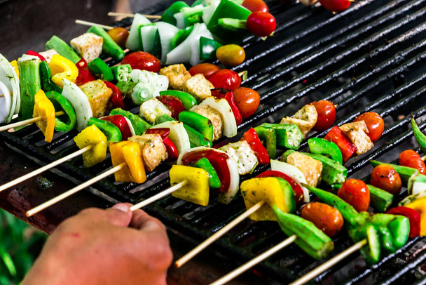Delicious vegetables are grilled on a barbeque - 写真・画像