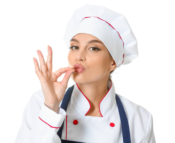 Schöne weibliche Köchin auf weißem Hintergrund - Foto, Bild