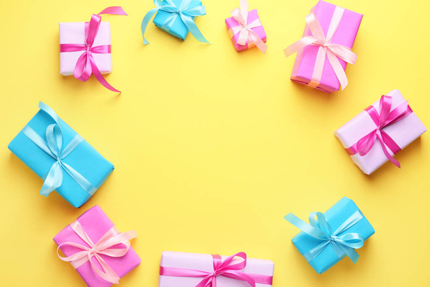 Frame made of Birthday gifts on color background - Foto, Imagem