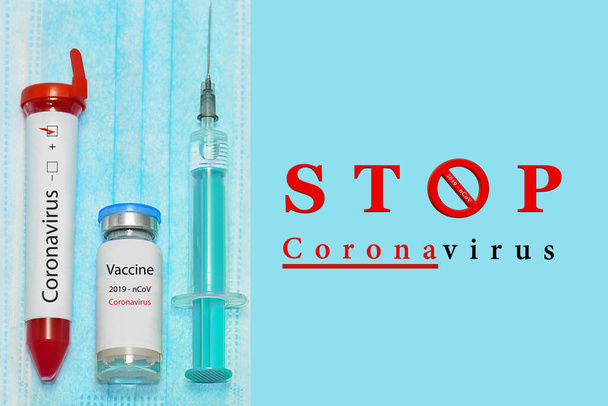 Coronavirus - 2019-nCoV. Coronavirus Vaccine.Test tube with blood identified by the 2019-nCoV coronavirus on blue background. - Photo, Image