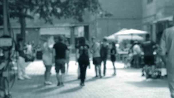 People walk on the street. Background blur - Footage, Video