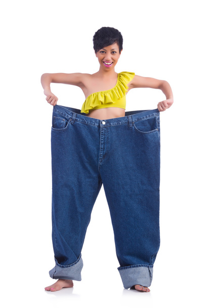Mujer en concepto de dieta con jeans grandes - Foto, Imagen