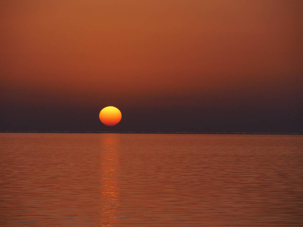 Sunset on the Sea, near Marsala in Sicily, Italy   - Foto, afbeelding