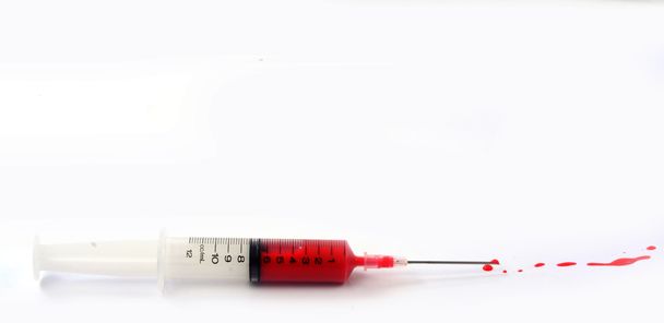 syringe with blood - Photo, Image