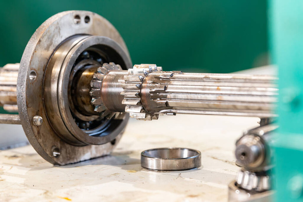 Splined shaft with bearing for repair of machine tool equipment. - Photo, Image